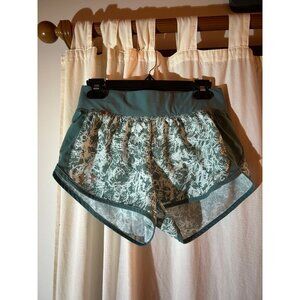 Under Armour teal running shorts size small